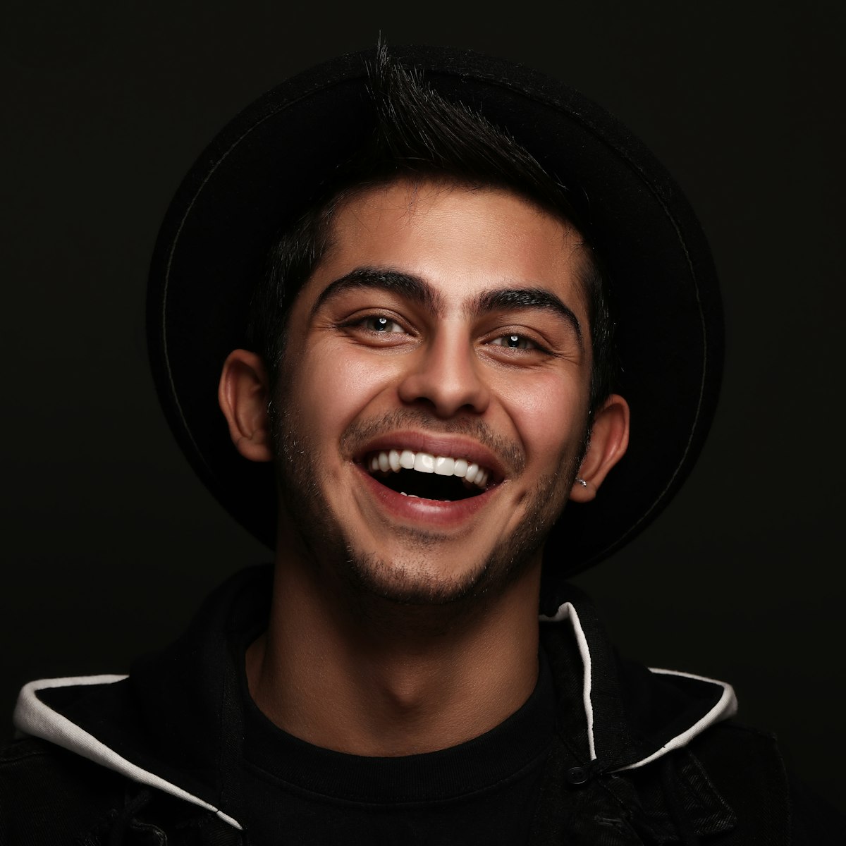 A happy patient smiling after a visit to Lumino Dental in Langley, BC